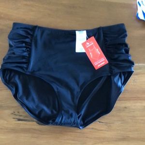 High waisted black bathing suit bottoms.